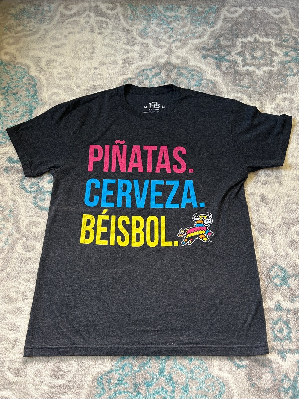 108 Stitches Black Tee with Pink, Blue & Yellow Graphics